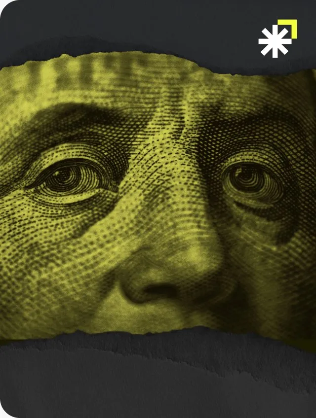 Żółto podbarwiony portret z banknotu na ciemnym tle, motyw sprzedaży